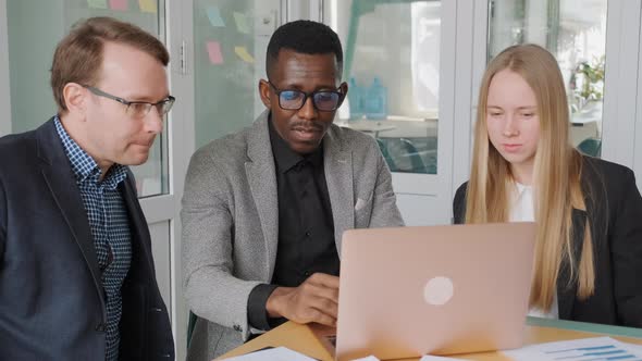 Three Business People Have Meeting Consultation in Office Discussing Project