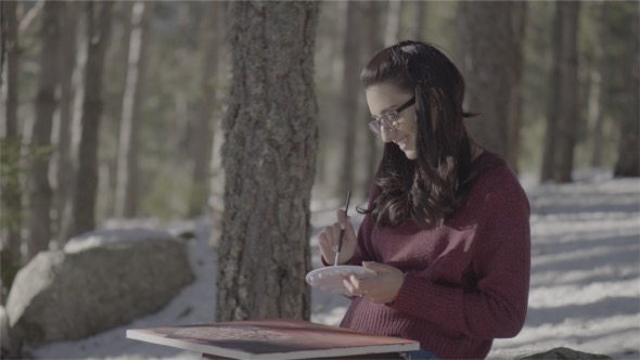 Girl in Cold Winter Woods