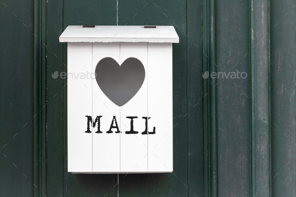 White vintage wooden mailbox