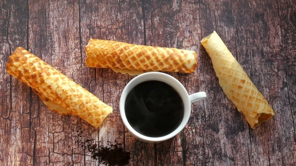 Breakfast with Coffee and Homemade Waffles on a Wooden Table. alt