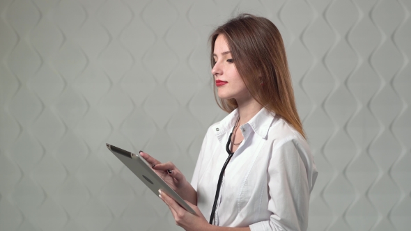 Doctor Using Tablet alt