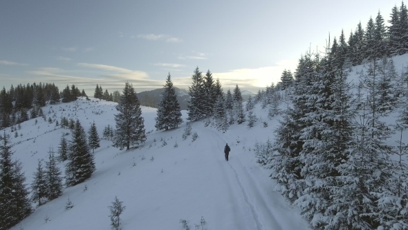 Ariel - Winter Hike - Man Walking in Mountains
