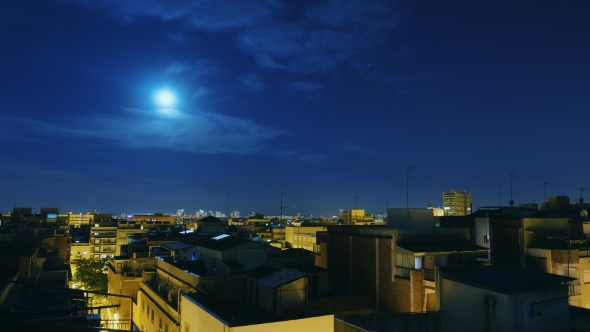 Moonrise Over the City and the Roofs of Houses.  From Evening To Dawn. The Sun Rises Over the City alt