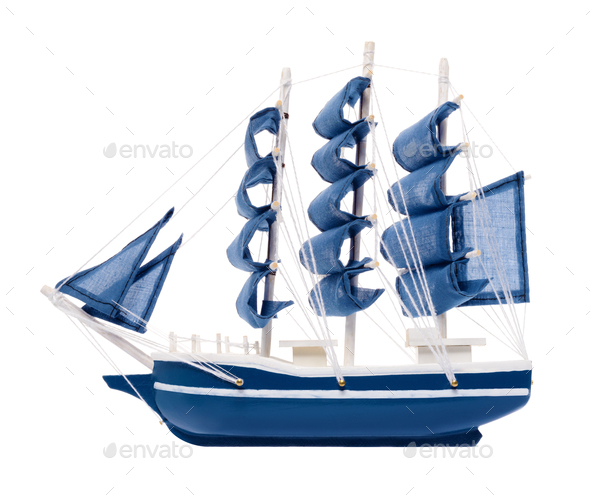 Blue sailboat with blue sails - Stock Photo - Images
