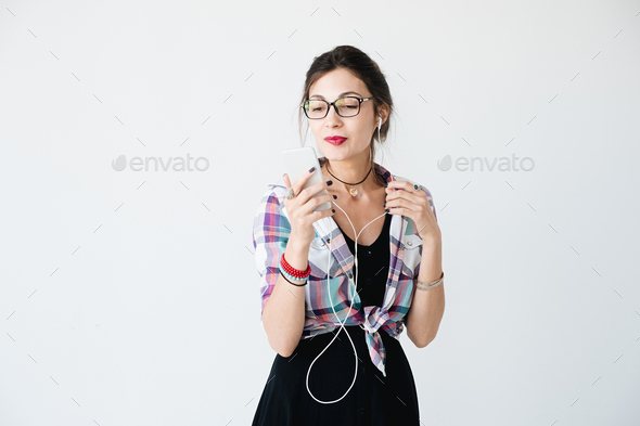 Pretty girl with phone studio shot - Stock Photo - Images