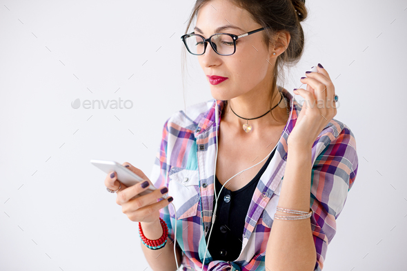 Close-up portrait of young successful woman in glasses touching - Stock Photo - Images