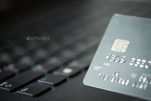 Credit card on laptop - Stock Photo - Images