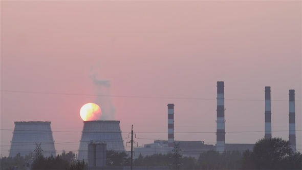 Sunset over the Thermoelectric Plant in the Smog