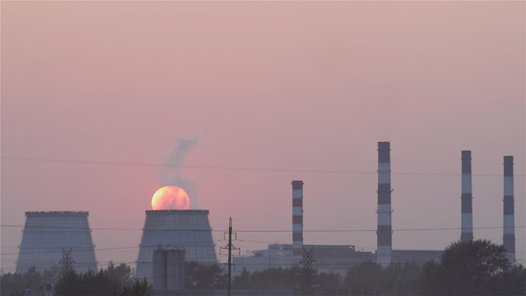 Sun in the Smoke of the Thermal Power Plant