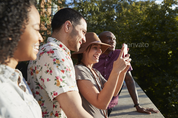 Group Of Tourists Taking Photos On Mobile Phones - Stock Photo - Images