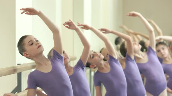 Young Caucasian Ballerinas at Ballet Studio alt