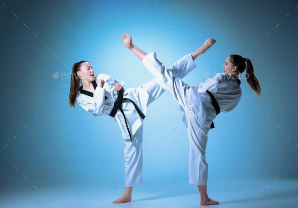 The studio shot of group of kids training karate martial arts Stock Photo by master1305