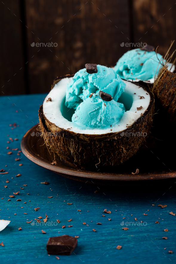 Blue ice cream in coconut bowl. Stock Photo by bondarillia PhotoDune