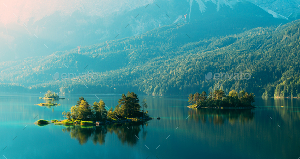 Fantastic sunrise on mountain lake Eibsee - Stock Photo - Images