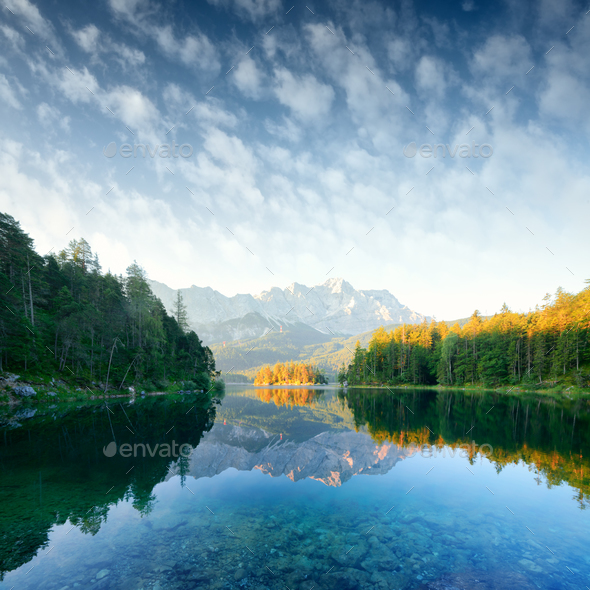 Fantastic sunrise on mountain lake Eibsee - Stock Photo - Images