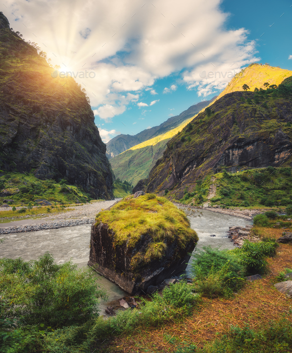 Amazing scene with mountains, beautiful river at sunset - Stock Photo - Images