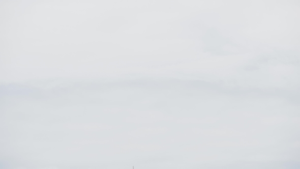 Airplane in the Clouds alt