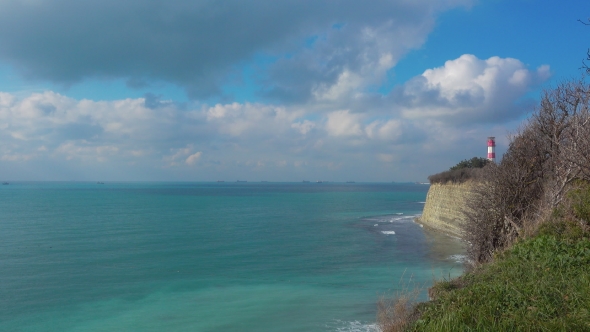 Lighthouse and Ocean Coast Cliff at Beautiful Day, Ships in the Distance alt