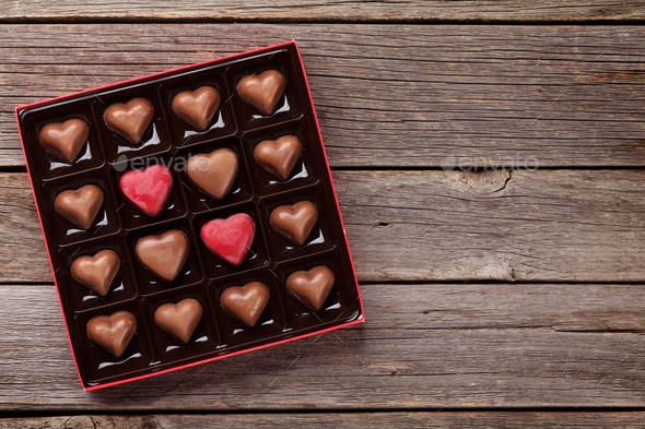 Heart shaped chocolate in box Stock Photo by karandaev | PhotoDune