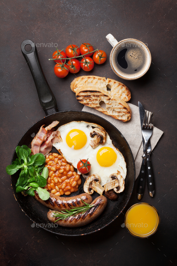 English breakfast. Fried eggs, sausages, bacon - Stock Photo - Images