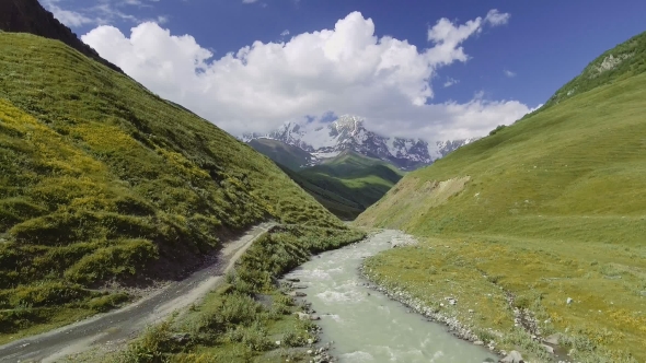 Mountain Valley at the Foot of Mt. Shkhara. Upper Svaneti, Georgia, Europe. Caucasus Mountains. alt