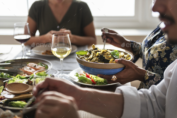 Friends gathering having Italian food together Stock Photo by Rawpixel
