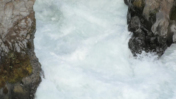 Rapid Stream of Mountain River in Iceland with Cold and Clear Water