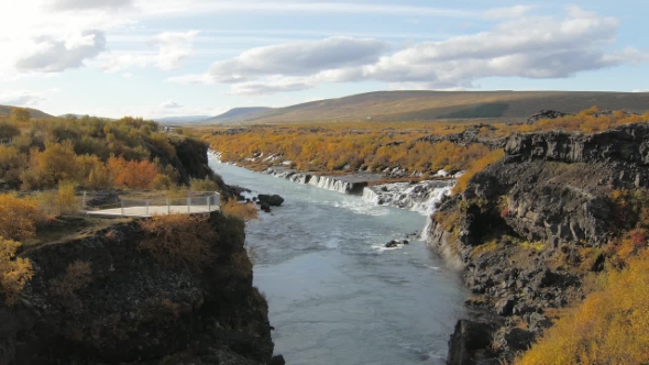 Canyon of Hvita River and View on Picturesque Waterfalls Flowing Through Lava Fields, Hraunfossar