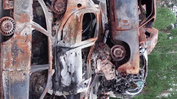 Vertical Video of Burned Cars During the War in Irpin Ukraine alt