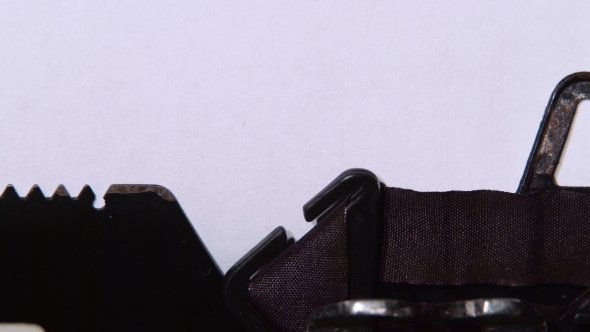 Word the End of a Book Printed By a Retro Typewriter. alt