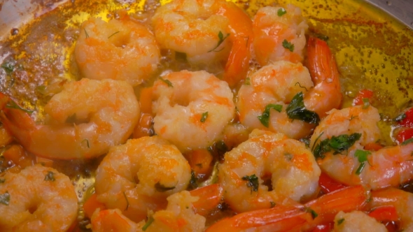 Skillet on Which Shrimps Are Fried alt