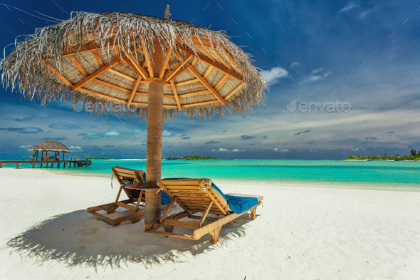 Two Chairs And Umbrella On Stunning Tropical Beach Maldives Stock