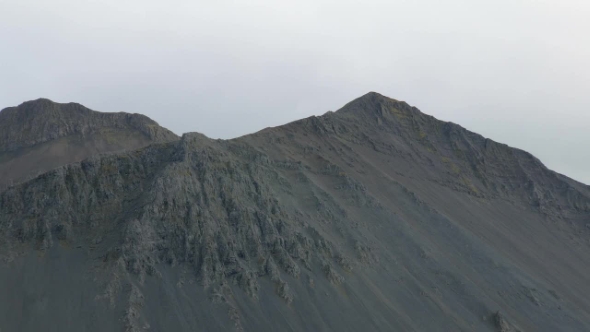 Naked Black Rocks Tops in Cloudy Weather, Grey Sky and Nobody, Dramatic Nature of Iceland
