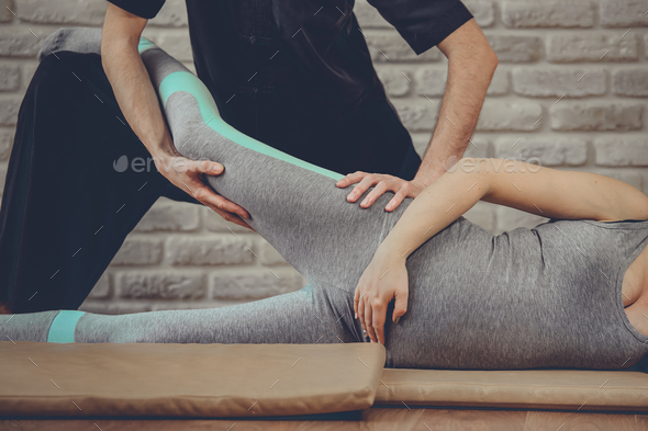 Traditional Thai Massage of a pregnant woman - Stock Photo - Images