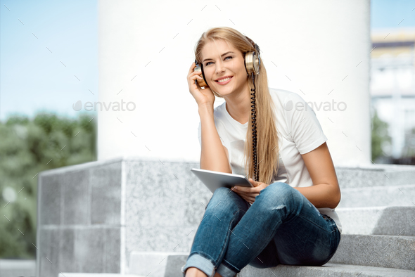 Surfing with music. - Stock Photo - Images
