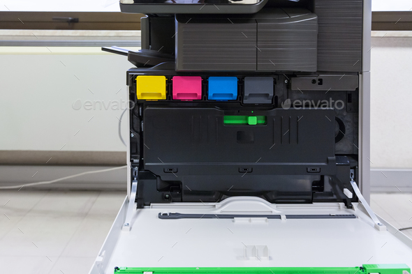 copier with four toner cartridges with open cover Stock Photo by vvoennyy