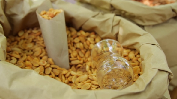 Nuts in a Bag on the Counter. Peanuts .