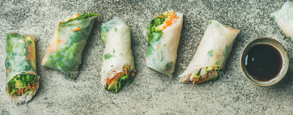 Vegan spring rice paper rolls with chopsticks, wide composition - Stock Photo - Images