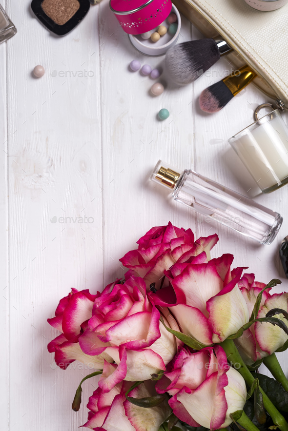 Women cosmetics and fashion items on white wooden background with copy space - Stock Photo - Images
