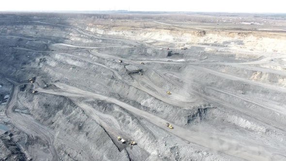 Panorama Aerial View Shot, Open Pit Mine, Coal Mining, Dumpers, Quarrying Extractive Industry