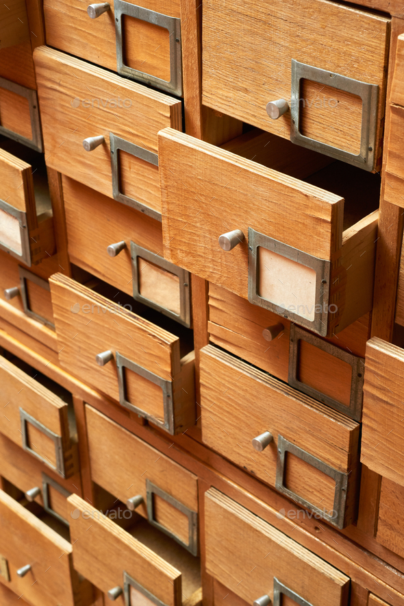 Wooden cabinet with drawers Stock Photo by sergeyskleznev