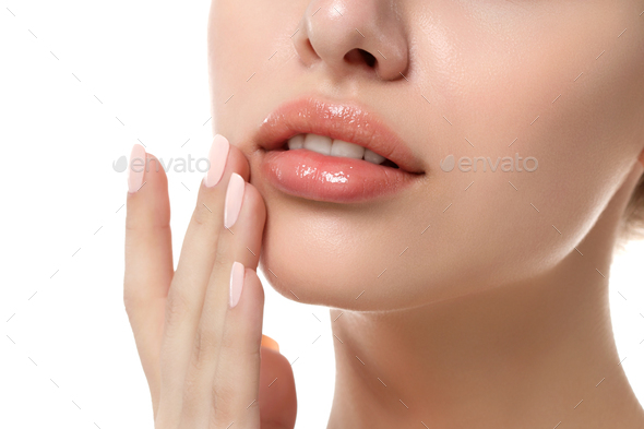 Close up view of young beautiful woman face - Stock Photo - Images