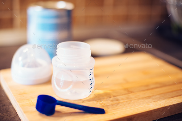 Baby formula in milk bottle - Stock Photo - Images