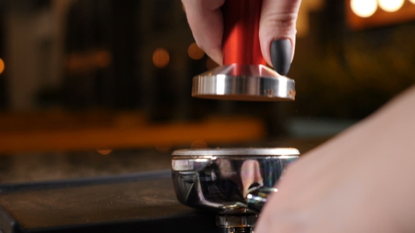 Coffee House Coffee Making Barista at Coffee shop Tamping Fresh Ground coffee Barista Is Preparing alt