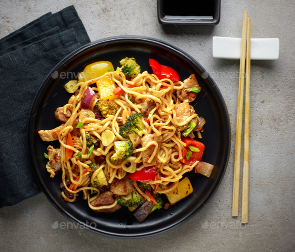 Plate of noodles with meat and vegetables Stock Photo by magone PhotoDune