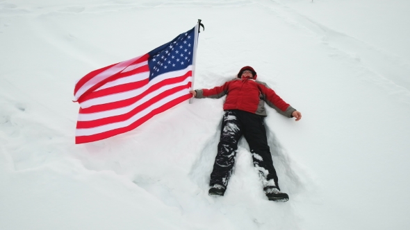 Man Is Waving US Flag Lies in the Snow