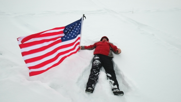 Man Is Waving US Flag Lies in the Snow