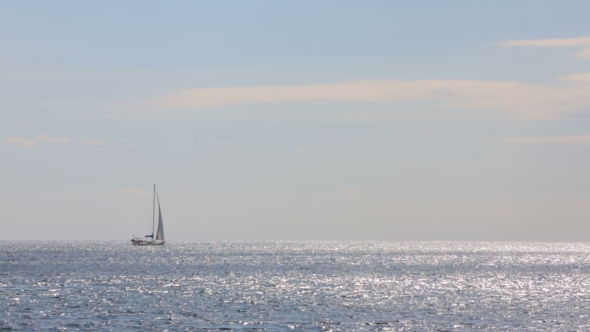 Sailboat on the Horizon in the Sea