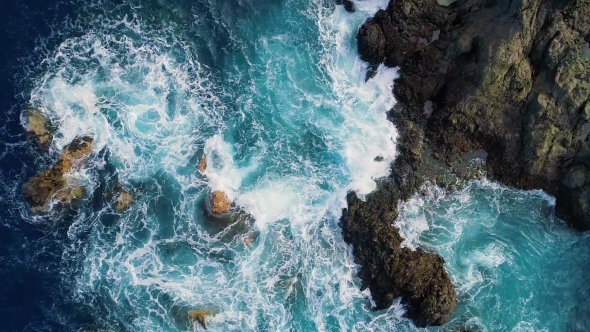 Top Down View of Waves and Clifs