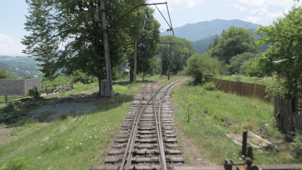 View To the Railway From the Window in Last Wagon in the Forest - Georgia alt